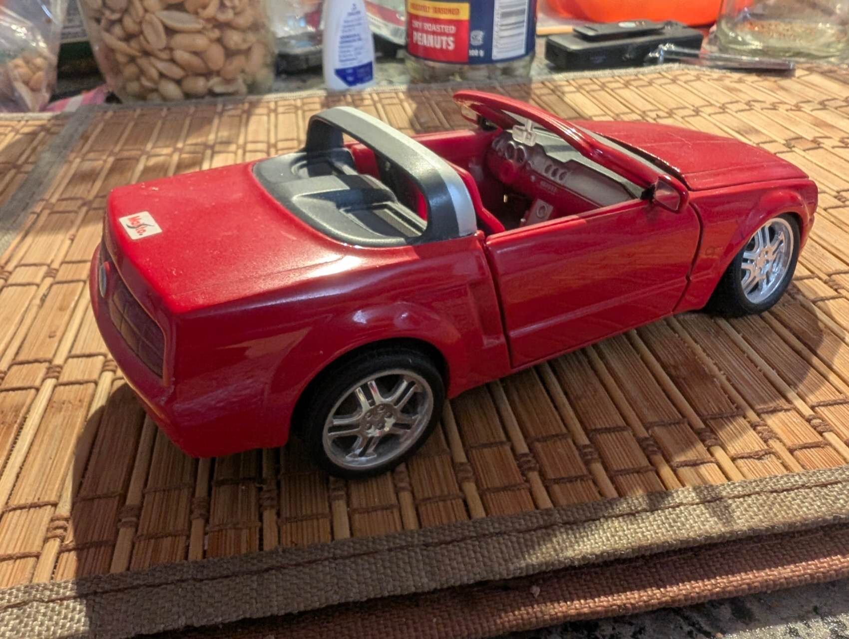 The toy that started it all, and his real-life dream car.  Kevin Li, Toronto, ON